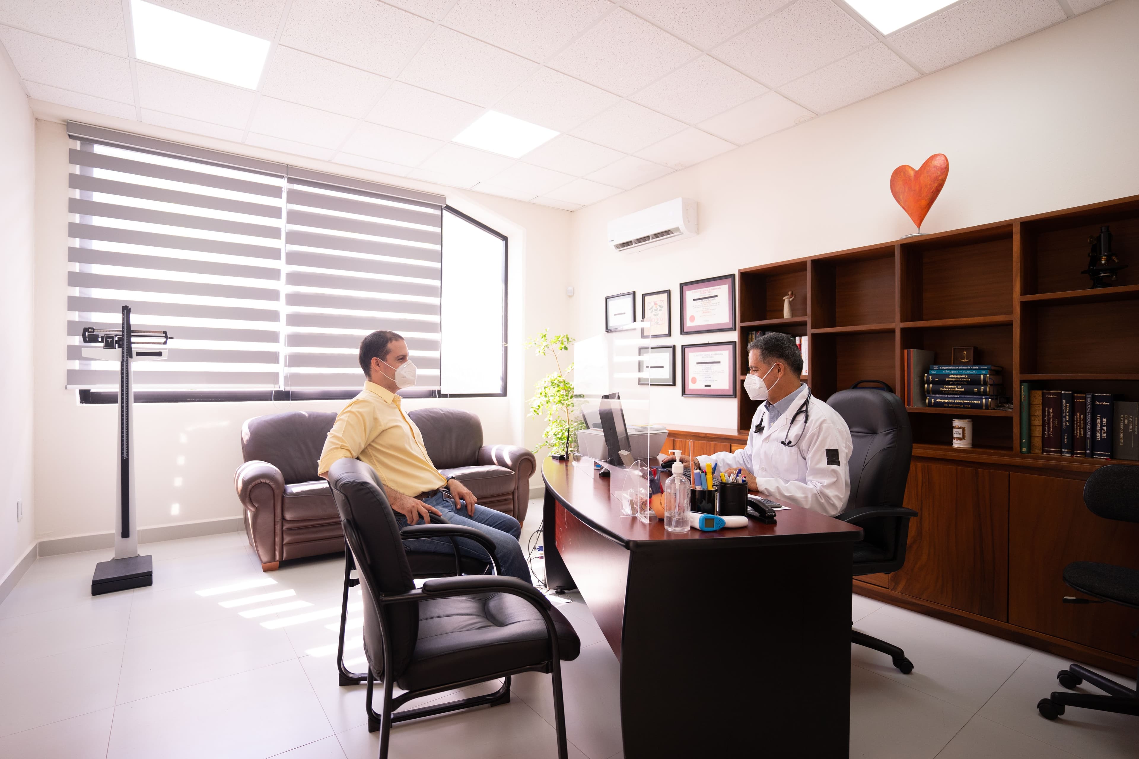 Patient meeting a doctor in person for a physical appointment